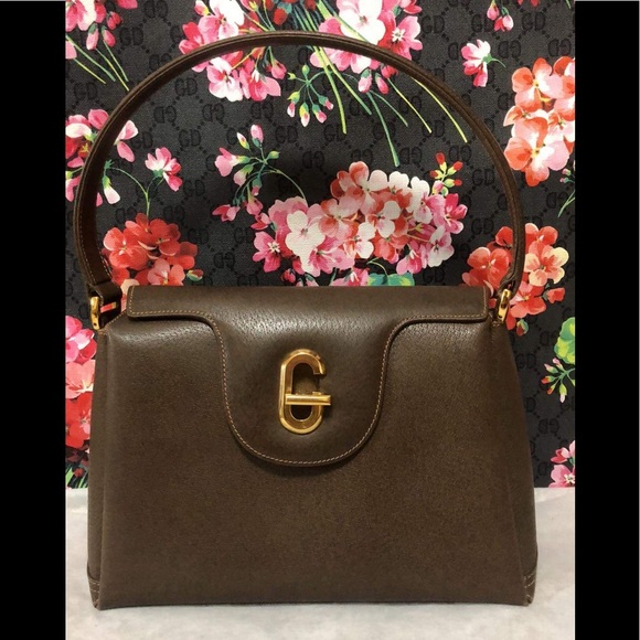 Gucci Handbags - 1970s Gucci Bordeaux Leather Top Handle Bag